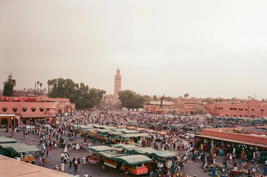 Bustling evening market stalls and crowds at Jemaa el-Fnaa square