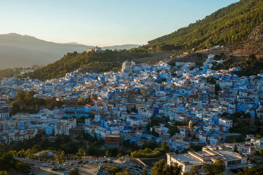 Late afternoon sunlight over the blue-washed town of Chefchaouen