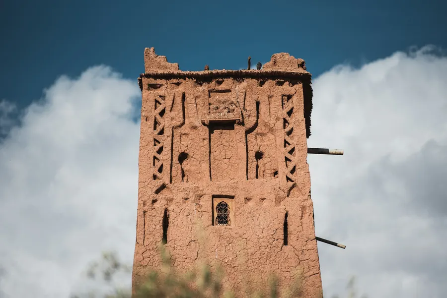 Earthen watchtower with geometric Berber designs at Ait Ben Haddou