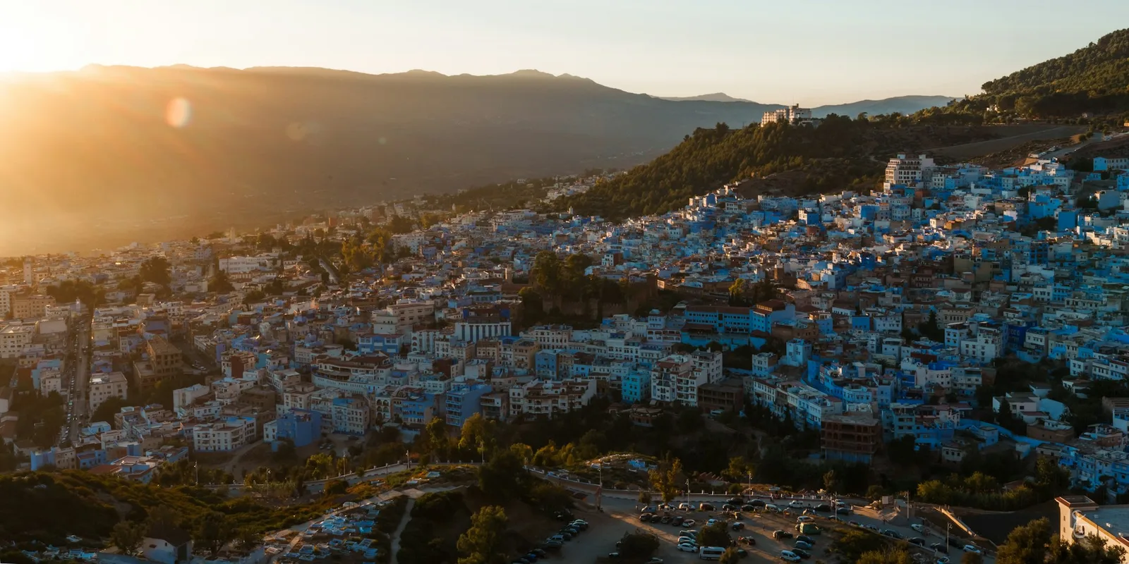 Sunrise over the hillside houses and Rif mountains of Chefchaouen