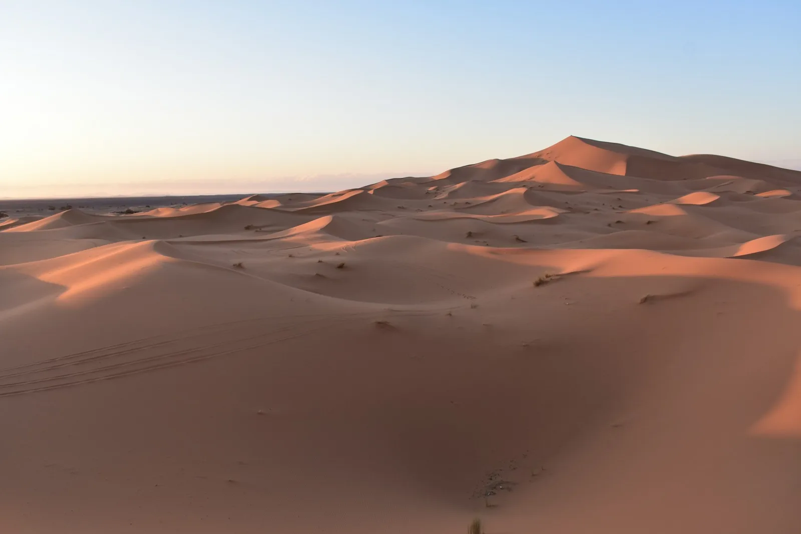 Panoramic sunrise over the vast dune sea of Erg Chebbi in Merzouga